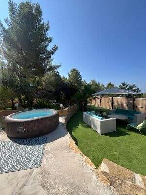 Jacuzzi et coin lounge, Villa Coda